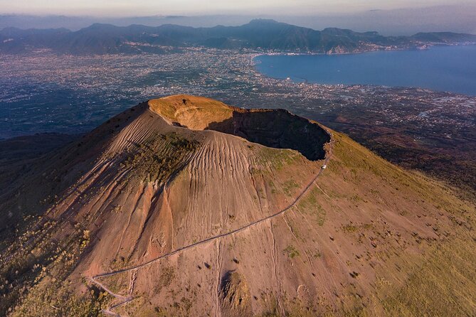 From Pompeii: Day Tour of Pompeii and Vesuvius with Bus Transfer - Pompeii with express entry: what you gain from the structure