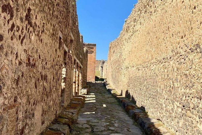 Pompeii the Buried city - The uncrowded southern walk: cast bodies of 79 A.D., then theaters